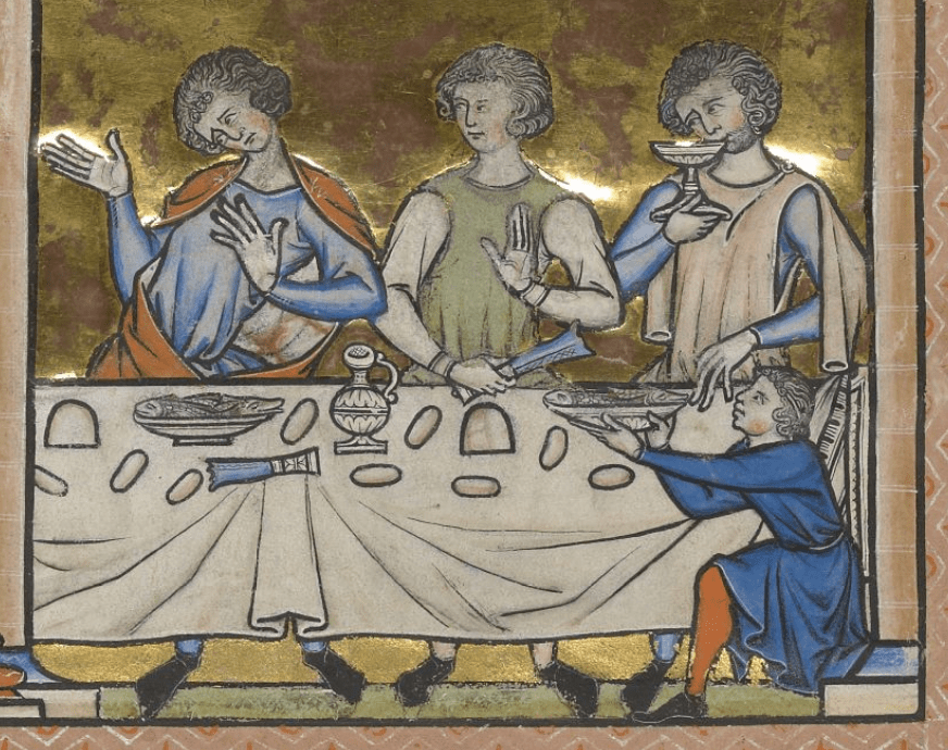 Medieval manuscript image of three men and a young boy sitting around a table with plates of fish and a jug.