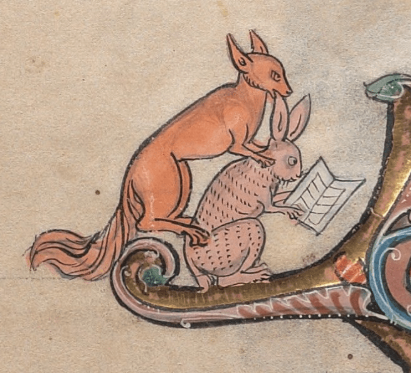 Medieval manuscript image of a rabbit reading from a book with a fox crouched on its back.