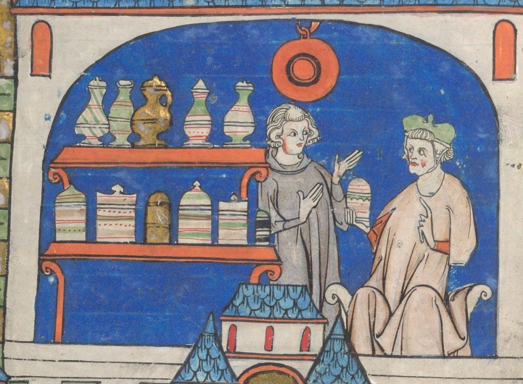 Medieval manuscript image of two men conversing in a room with shelves stocked with various jars; one man points to a jar in his hand, while the other gestures with both hands.