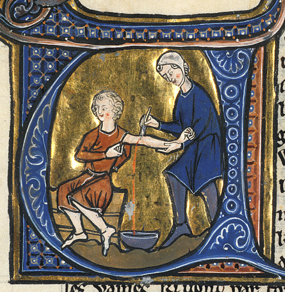 Medieval manuscript image of a man sitting on a bench with his left arm outstretched; another man cuts his arm just above the elbow with a knife, letting the blood pour down into a bowl on the ground.