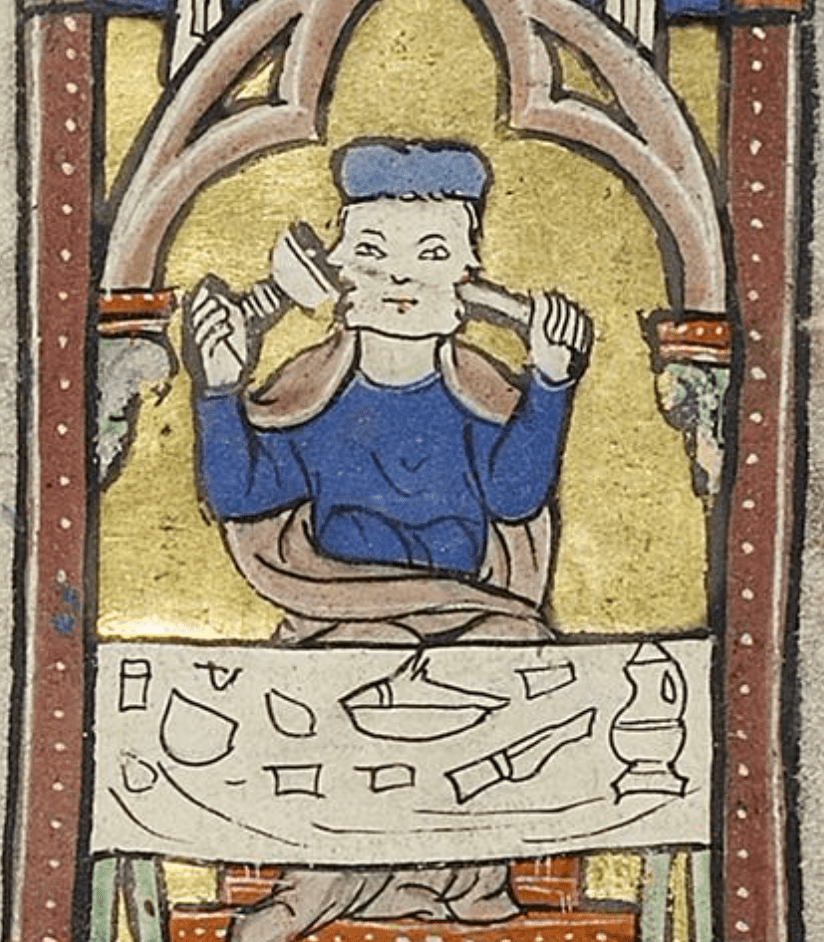 Medieval manuscript image of a two-faced Janus figure seated at a feast; one mouth eats and the other mouth drinks from a goblet.