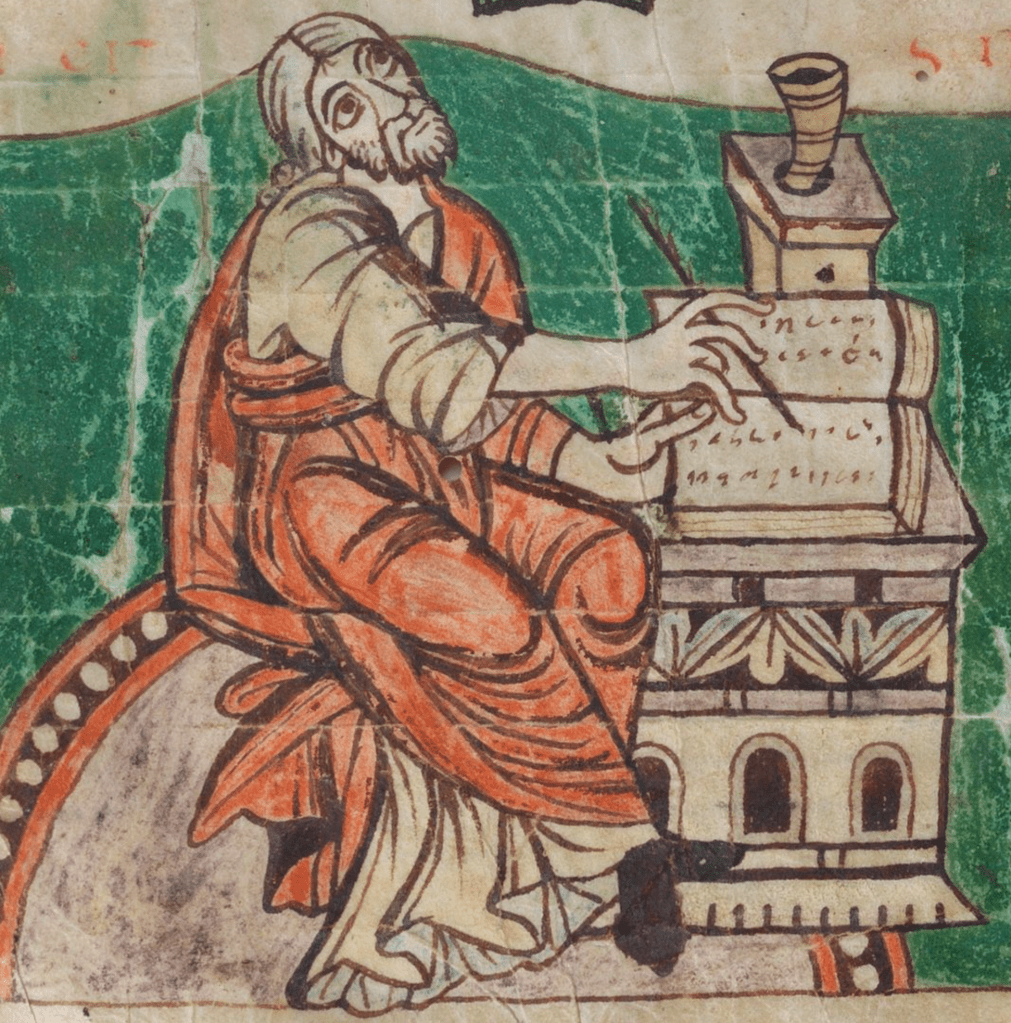 Medieval manuscript image of the psalter author writing in a book at a desk, a feather in his hand, with an ink horn beside him.
