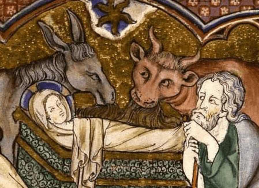 Medieval manuscript image of baby Jesus in a manger, with Joseph watching over him, a star shining above, and a donkey and an ox munching on hay beside him.