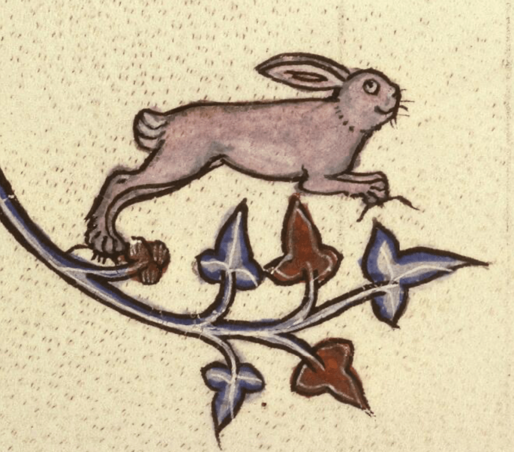 Medieval manuscript image of a cheerful-looking rabbit running across marginal foliage.