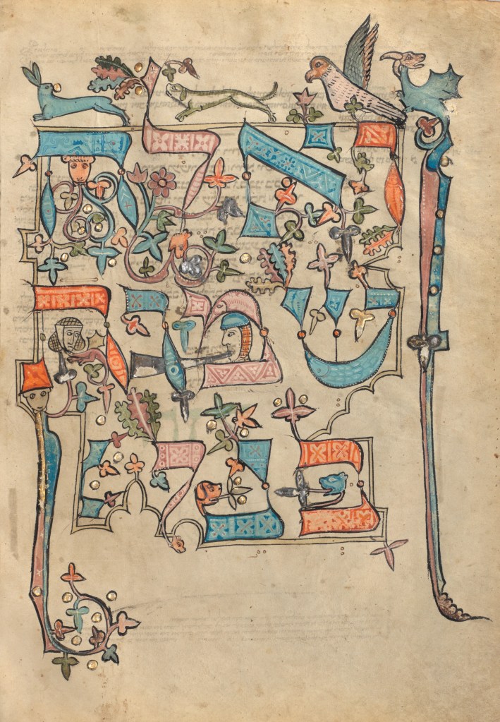 Medieval manuscript page with large colourful and decorative Hebrew letters, beautifully surrounded and intertwined with flowers, leaves, people and various animals such as a rabbit, dog, bird and dragon.