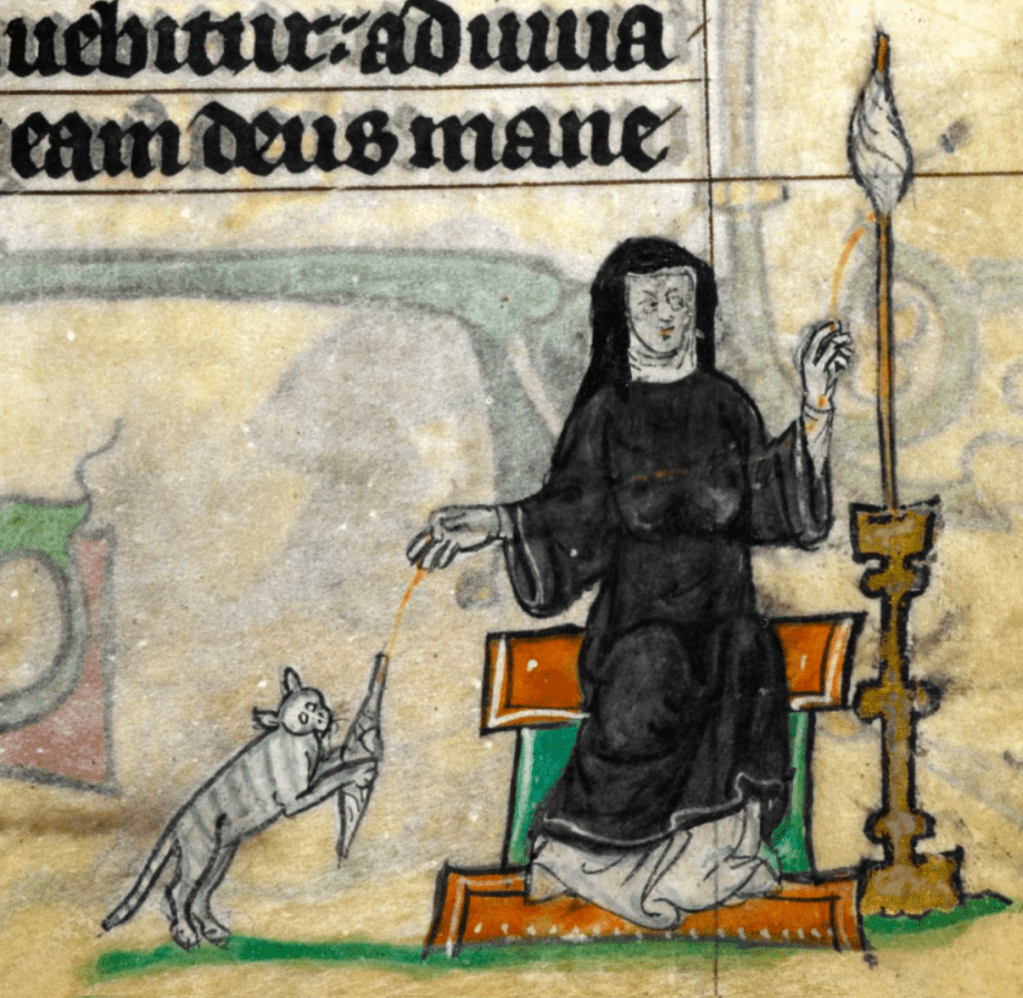 Medieval manuscript image of a woman spinning using a freestanding distaff; her cat has pounced on her twirling spindle.