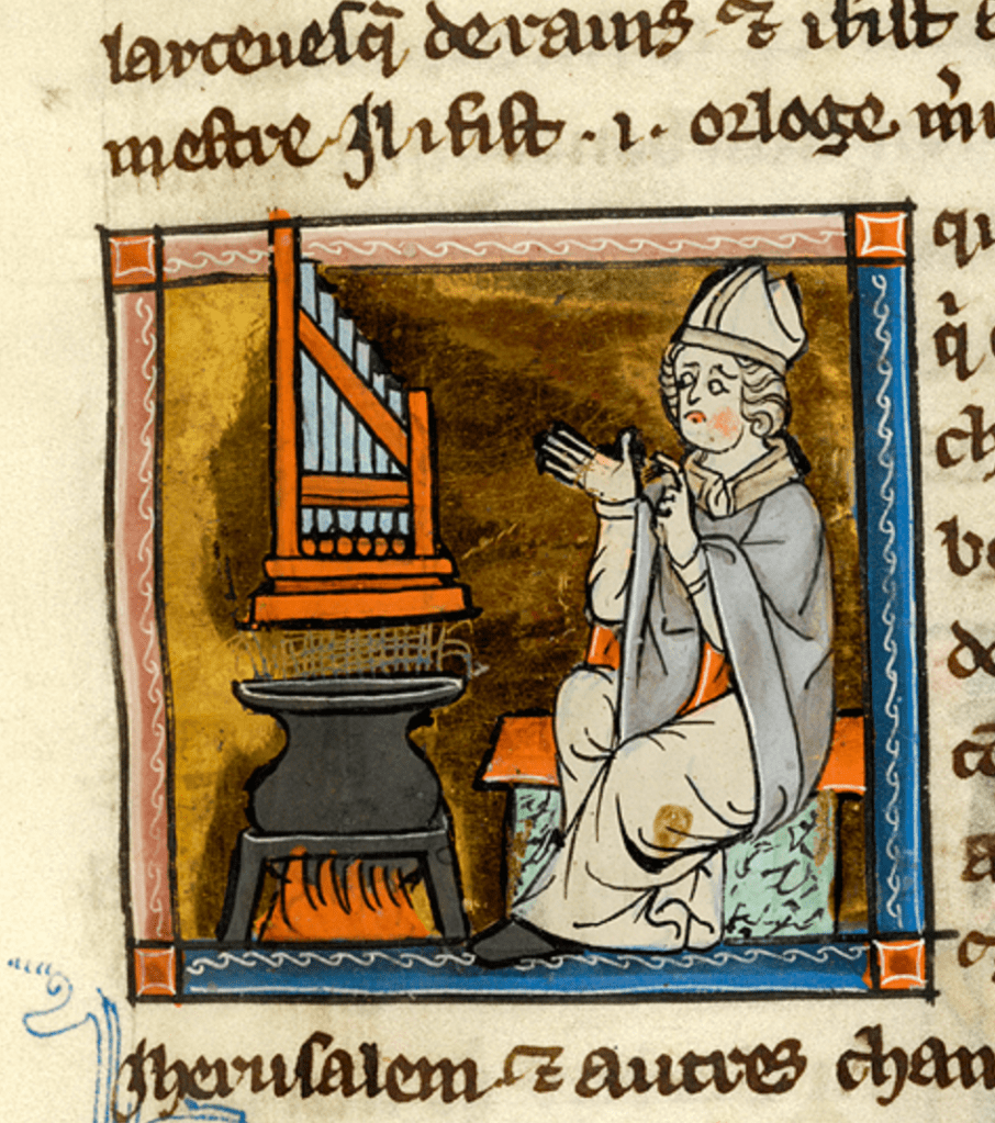 Medieval manuscript image of a bishop wearing mitre and chasuble gesturing with both hands and looking at an organ that hovers above steam rising from cauldron on a stand over a fire.