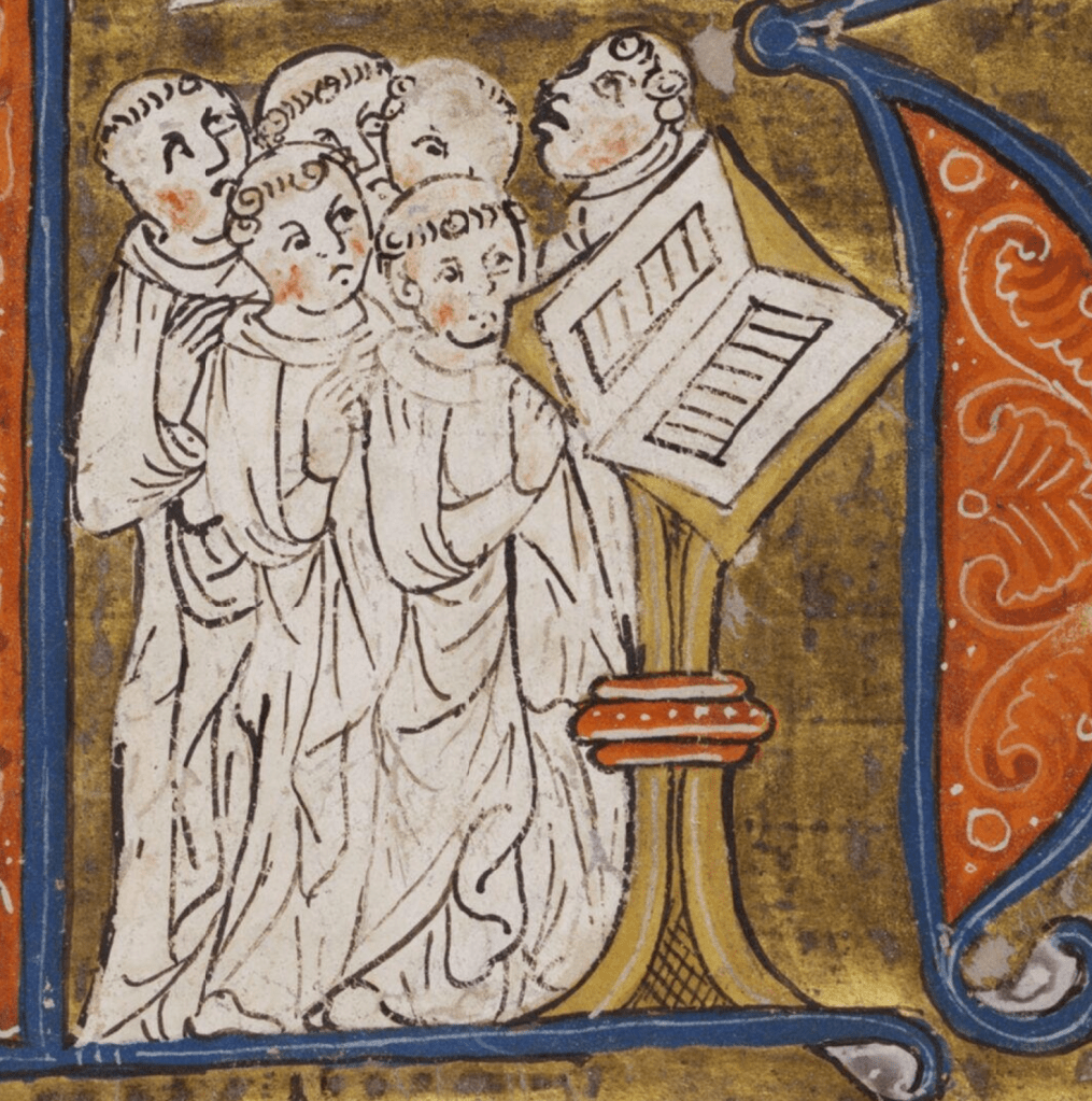 Medieval manuscript image of six Cistercian monks singing at a lectern.